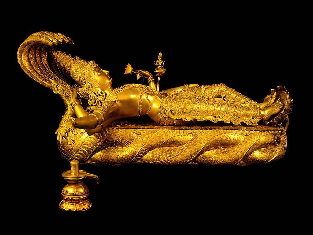 Golden idol of Lord Padmanabha reclining on the serpent Anantha at Padmanabhaswamy Temple Kerala
